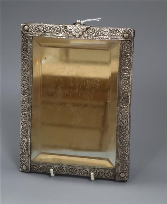 A Persian repousse white metal mounted rectangular hanging mirror, 20.7cm.